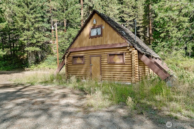 27510 Hwy 97, Cle Elum, WA 98922 - view of outdoor structure featuring an outbuilding and a view of trees