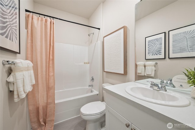 bathroom with shower / bath combo with shower curtain, toilet, and vanity