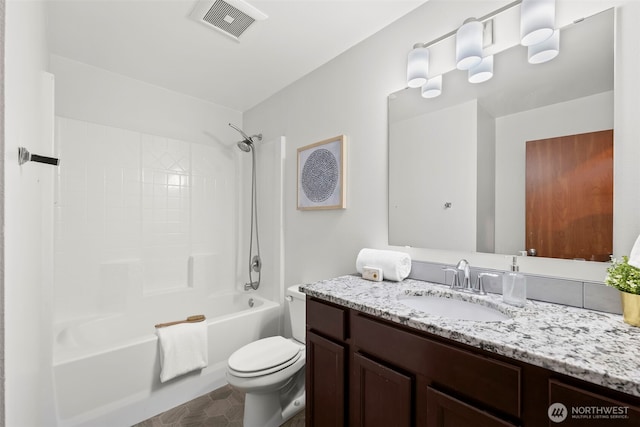 full bathroom featuring visible vents, bathing tub / shower combination, toilet, and vanity