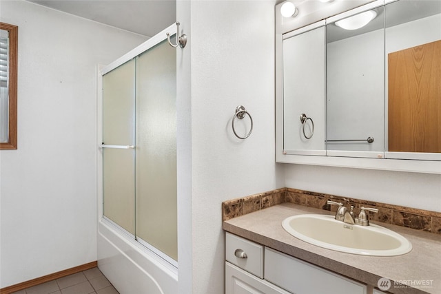2710 Willowdale Rd, Ellensburg, WA 98926 - bathroom featuring vanity, tile patterned floors, and bath / shower combo with glass door
