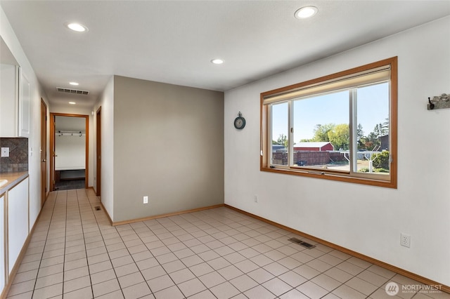 2710 Willowdale Rd, Ellensburg, WA 98926 - unfurnished room with recessed lighting, baseboards, and light tile patterned flooring
