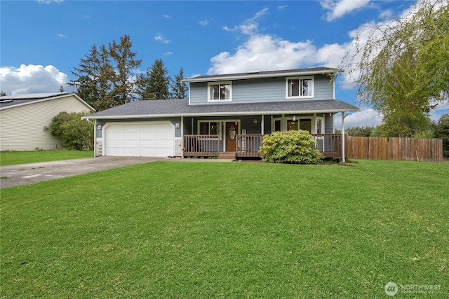 traditional home featuring fence, a front lawn, a garage, a porch, and concrete driveway