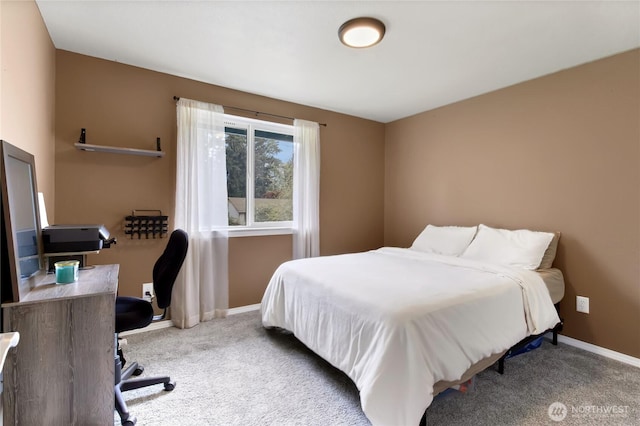 carpeted bedroom with baseboards