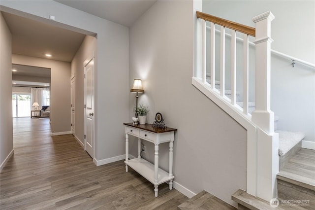15255 201st Ave E, Bonney Lake, WA 98391 - corridor featuring stairs, wood finished floors, baseboards, and recessed lighting