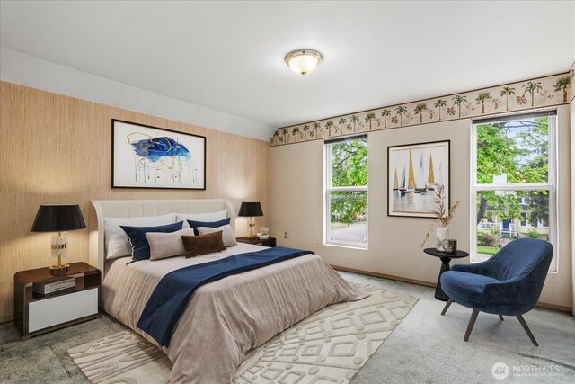 carpeted bedroom with baseboards