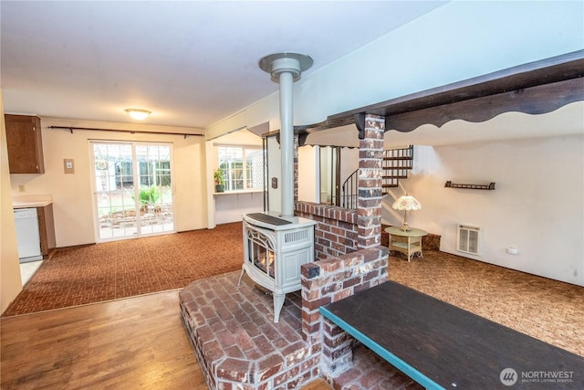 2916 SW 329th St, Federal Way, WA 98023 - carpeted living area with a wood stove and stairs