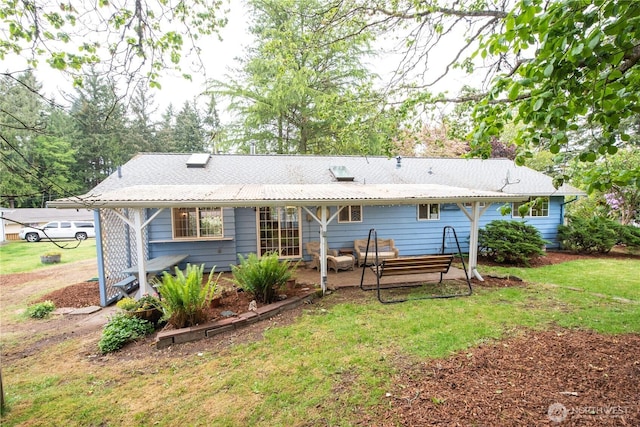 2916 SW 329th St, Federal Way, WA 98023 - rear view of property featuring a patio area and a lawn