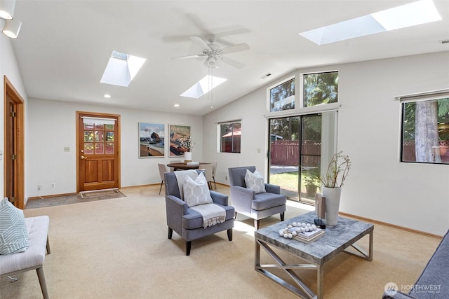 living room featuring a skylight, light carpet, healthy amount of natural light, lofted ceiling, and recessed lighting