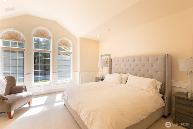 581 Harbor View Dr, Port Angeles, WA 98363 - bedroom with carpet flooring, vaulted ceiling, and a wainscoted wall