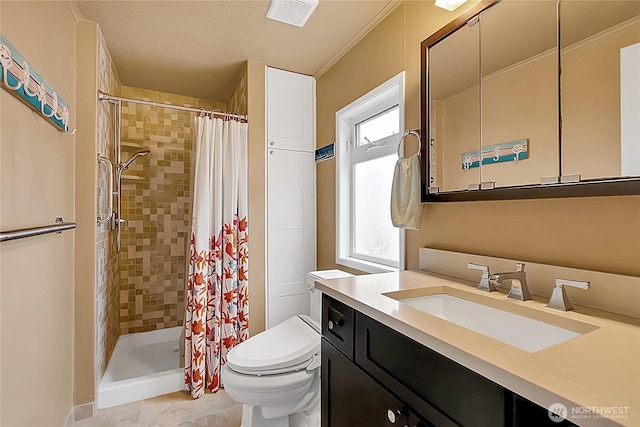 bathroom with visible vents, vanity, toilet, tile patterned floors, and a shower stall