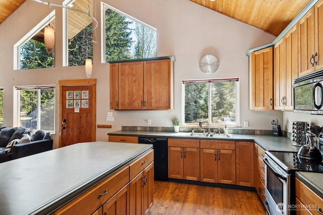 251 Kachess River Rd, Easton, WA 98925 - kitchen featuring black appliances, wood ceiling, a sink, dark wood-style flooring, and brown cabinetry