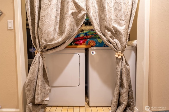 laundry area with independent washer and dryer and laundry area