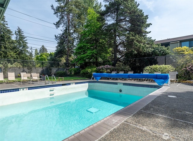 community pool with fence