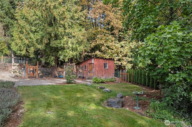 10871 Alfred St, Rockport, WA 98283 - view of yard with fence, an outdoor structure, and a storage shed