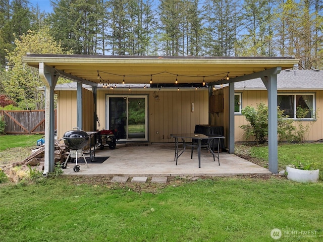exterior space featuring fence and area for grilling