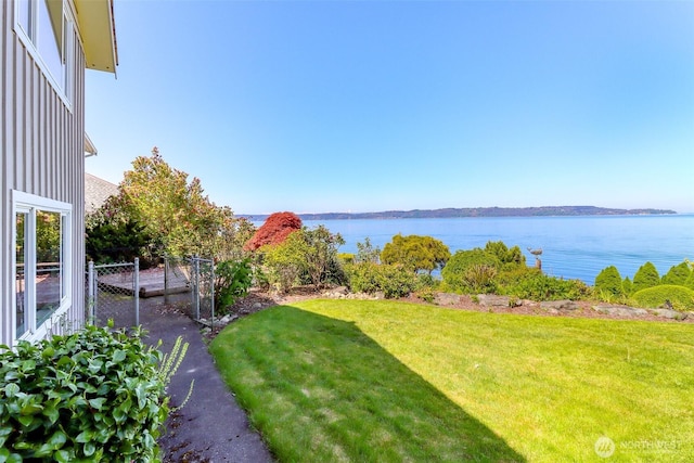 view of yard with a water view
