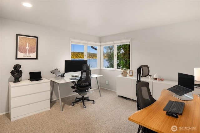 carpeted office space with baseboards and recessed lighting