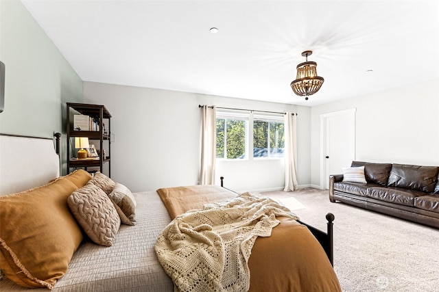 carpeted bedroom with baseboards