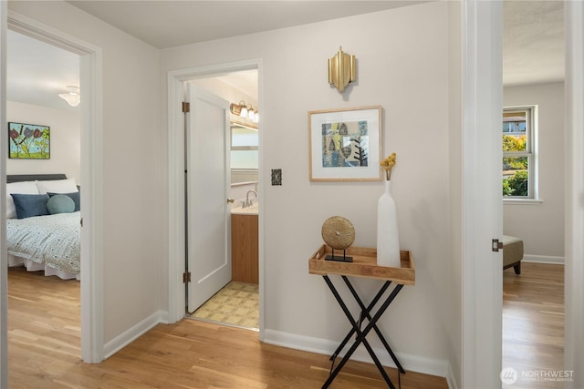 6743 40th Ave SW, Seattle, WA 98136 - hall featuring light wood finished floors and baseboards