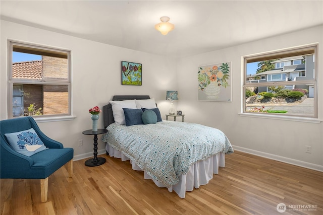 6743 40th Ave SW, Seattle, WA 98136 - bedroom with light wood-type flooring