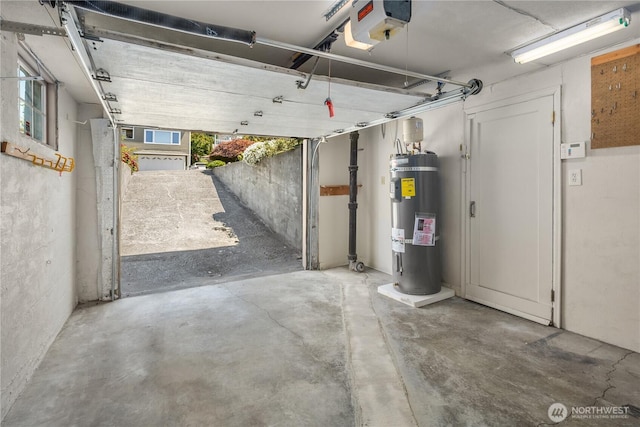 6743 40th Ave SW, Seattle, WA 98136 - garage featuring secured water heater and a garage door opener