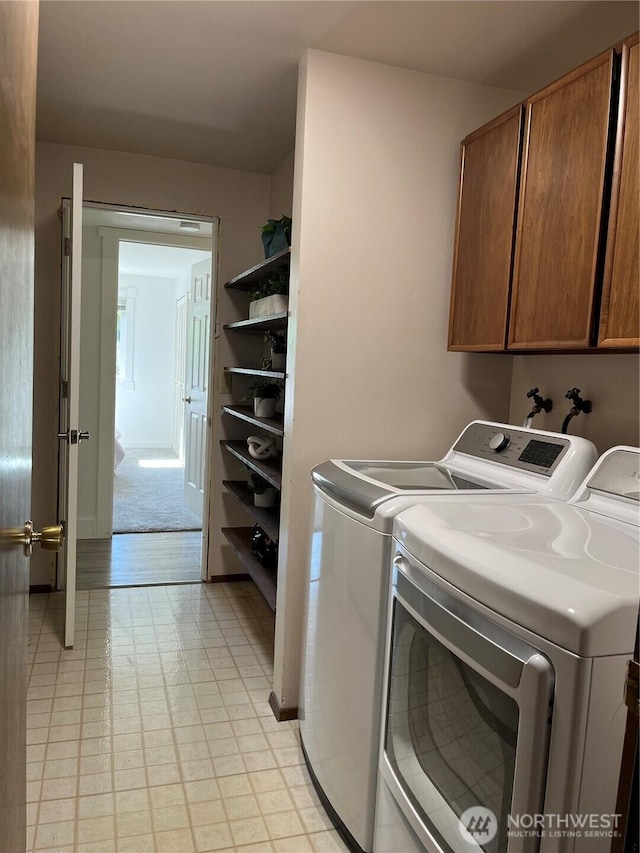 2940 161st Ave SE, Bellevue, WA 98008 - washroom with washing machine and clothes dryer and cabinet space