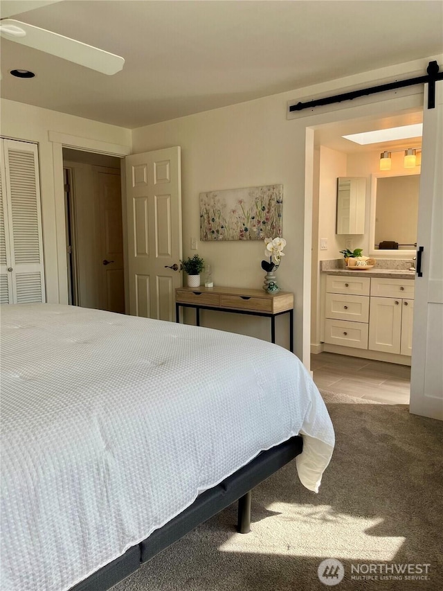 2940 161st Ave SE, Bellevue, WA 98008 - carpeted bedroom with ensuite bath
