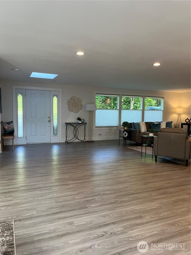 2940 161st Ave SE, Bellevue, WA 98008 - entrance foyer with wood finished floors, recessed lighting, and a skylight