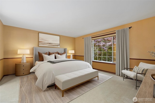 carpeted bedroom with baseboards