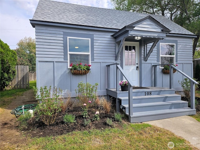 108 W 3rd St, Lind, WA 99341 - view of front of home featuring fence and roof with shingles