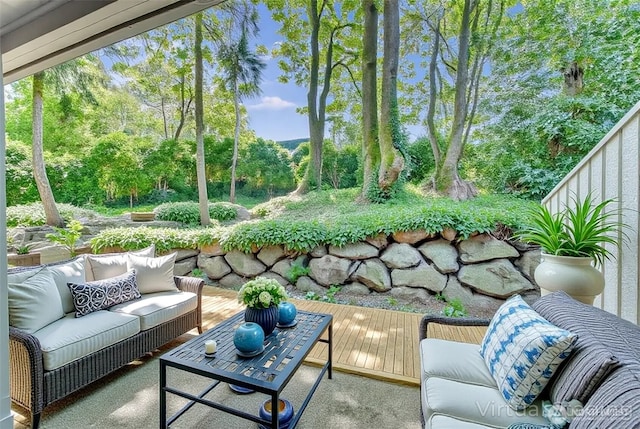 sunroom / solarium with an outdoor living space