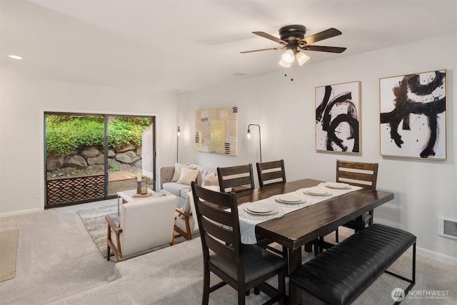11547 SE 175th St Unit 1, Renton, WA 98058 - dining room featuring ceiling fan, baseboards, and carpet floors