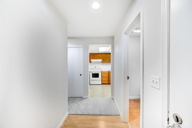 11547 SE 175th St Unit 1, Renton, WA 98058 - corridor featuring baseboards and light wood finished floors