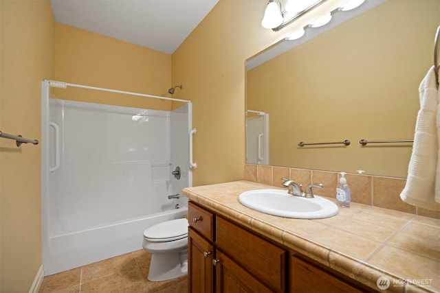full bath with shower / bathtub combination, toilet, tile patterned floors, and vanity