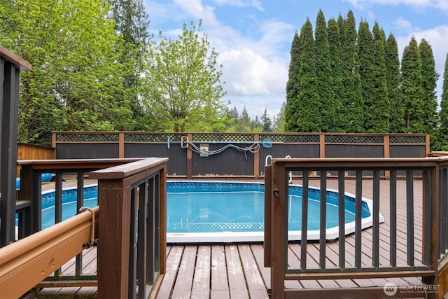 4130 Lakeway Dr, Bellingham, WA 98229 - outdoor pool featuring fence and a wooden deck