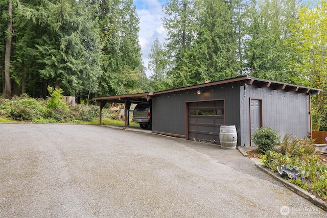 4130 Lakeway Dr, Bellingham, WA 98229 - garage featuring a garage and aphalt driveway