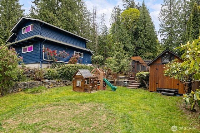 4130 Lakeway Dr, Bellingham, WA 98229 - exterior space featuring an outdoor structure, a playground, and a storage unit