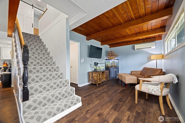 4130 Lakeway Dr, Bellingham, WA 98229 - living area with an AC wall unit, stairs, a barn door, a wooden ceiling with exposed beams, and dark wood-style flooring