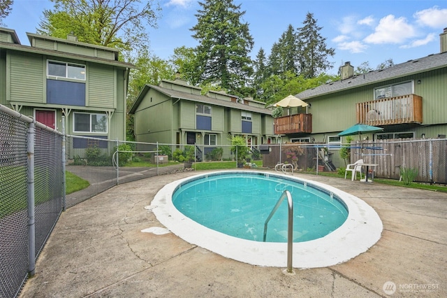 pool featuring fence