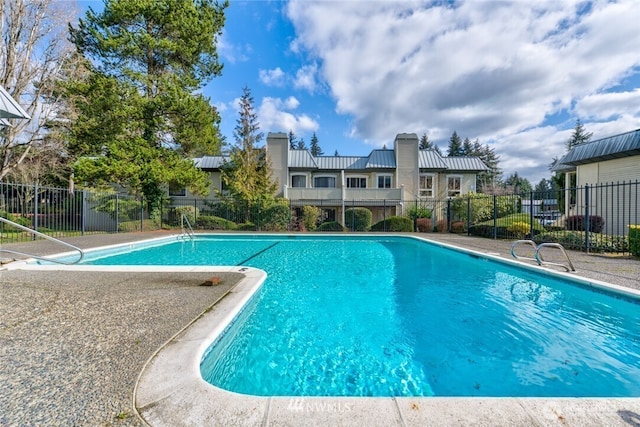 community pool with fence