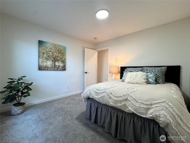 bedroom with carpet floors and baseboards