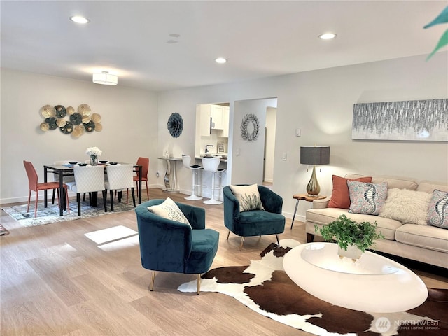 10221 NE 16th St Unit H5, Bellevue, WA 98004 - living room featuring recessed lighting, baseboards, and light wood-style flooring