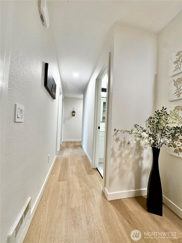10221 NE 16th St Unit H5, Bellevue, WA 98004 - corridor featuring light wood-style floors, baseboards, and visible vents