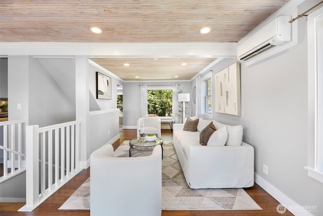 living area featuring a wall mounted AC, wood finished floors, wooden ceiling, crown molding, and baseboards