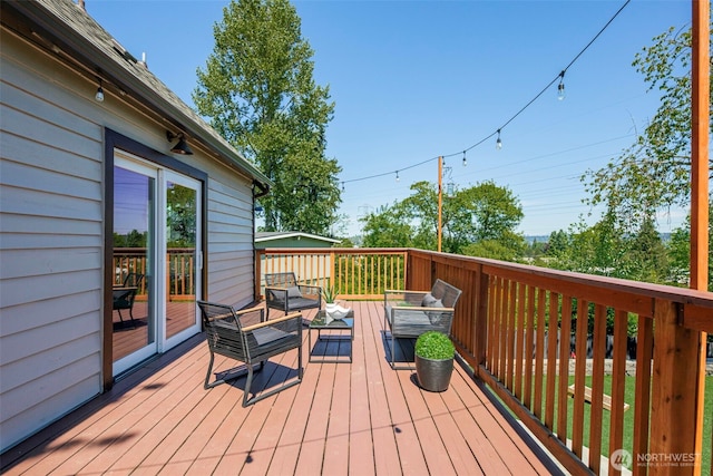 deck featuring an outdoor hangout area
