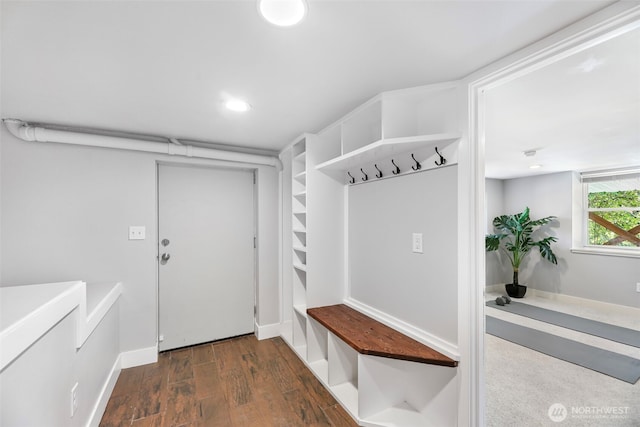 mudroom with wood finished floors and recessed lighting