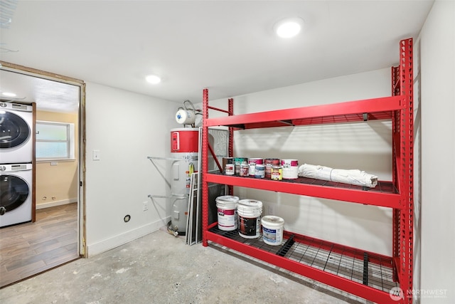 storage featuring stacked washing machine and dryer