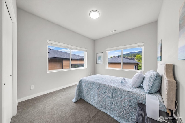 2055 NW Talus Dr Unit 3, Issaquah, WA 98027 - carpeted bedroom featuring baseboards