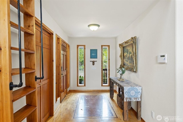 17613 Butler Rd, Snohomish, WA 98290 - entryway featuring baseboards and light wood finished floors