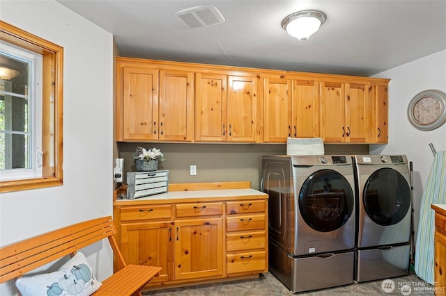 17613 Butler Rd, Snohomish, WA 98290 - laundry area featuring cabinet space and independent washer and dryer